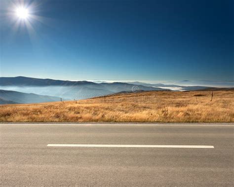 Side View of Empty Highway in Mountain Range Stock Image - Image of ...