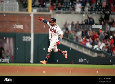 Atlanta Braves' Eddie Rosario (8) celebrates after hitting a two-run ...