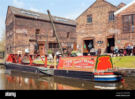 Historic working Canal narrowboat moored at the Middleport pottery factory on the Trent and ...