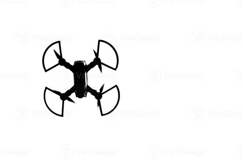 Silhouette of a drone in the sky 12943610 Stock Photo at Vecteezy