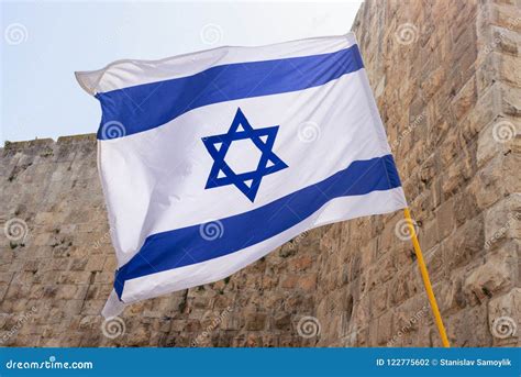 Israel Flag Against Western Wall in Jerusalem Stock Photo - Image of historic, light: 122775602