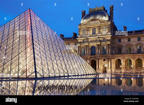 Louvre museum and pyramid night view Stock Photo - Alamy