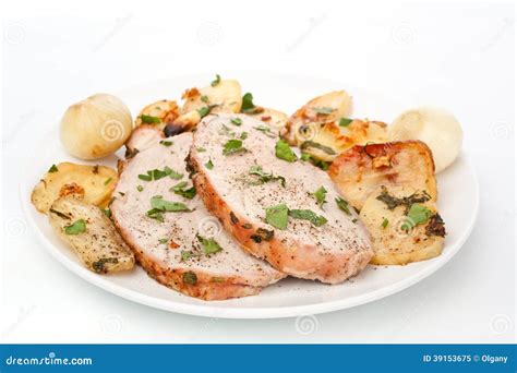 Roaste Pork Loin Sliced with Roasted Potatoes Stock Image - Image of ...