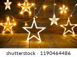 Photo of Green Christmas star border on rustic wood | Free christmas images