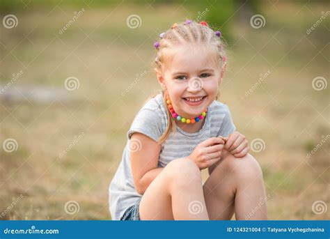 Smiling Little Girl in a Summer Park Stock Photo - Image of nature, childhood: 124321004