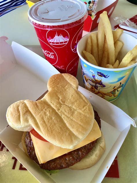 I miss eating Mickey-shaped foods at the Parks. Here's a Mickey burger ...