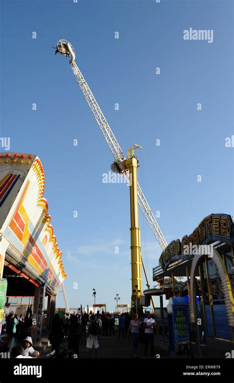 Brighton UK June 2015 - People enjoy the Booster fairground ride on Stock Photo: 83533837 - Alamy