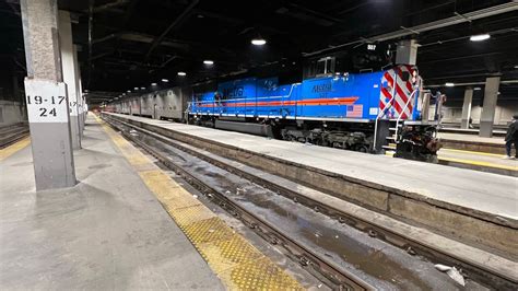 Metra SD70MACH locomotive departs Chicago Union Station on train 2143 to Fox Lake, Illinois ...