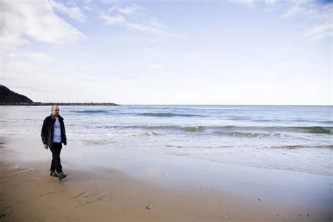 Man alone on beach — Stock Photo © kelpfish #7454195