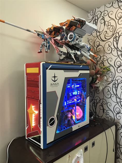 an old computer is sitting on top of a cabinet