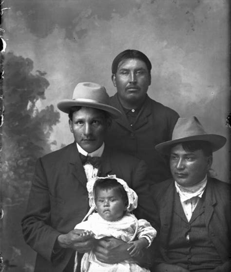 Portrait of Ho-Chunk Men and a Ho-Chunk Infant | Photograph | Wisconsin Historical Society