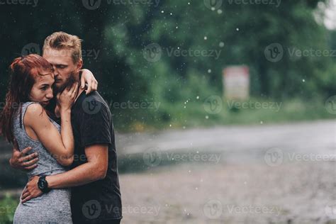 beautiful couple hugging in the rain 11763797 Stock Photo at Vecteezy