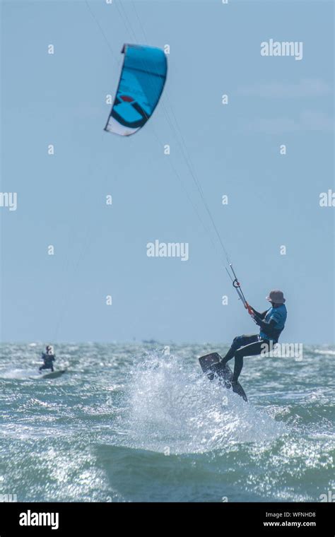 Kitesurfing on West Wittering beach, West Sussex Stock Photo - Alamy