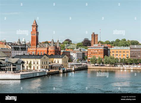 the waterfront harbour in Helsingborg, Sweden with the towers of the city hall and Kärnan, June ...