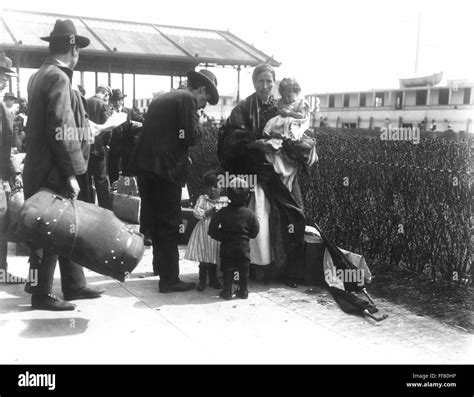 ELLIS ISLAND, EARLY 1900s. /nImmigrants about to board the Ellis Island ferry, early 1900s Stock ...