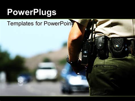 PowerPoint Template: Police officer with police radio affixed to belt and blurry background (29976)