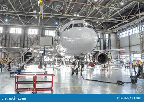 Commercial Aircraft Jet on Maintenance of Engine and Fuselage Check ...