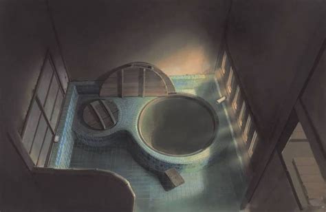 an aerial view of a bathroom with a sink and mirror