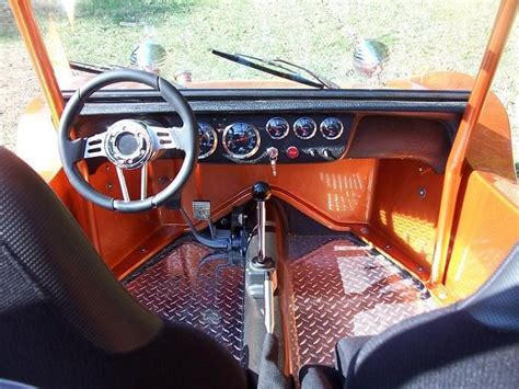 Orange Dune Buggy Interior with Steering Wheel and Dashboard