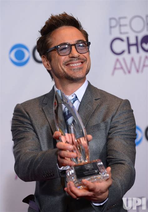 Photo: Robert Downey Jr. wins Favorite Movie Actor award at the 39th annual People's Choice ...