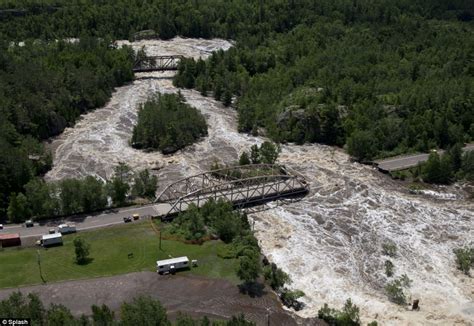 Minnesota flooding continues as Duluth begins million-dollar clean up ...