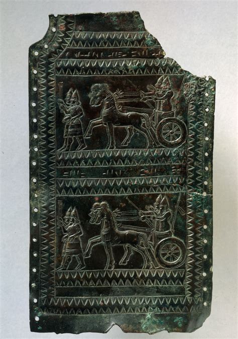 Urartian Bronze Plaque Fragment, c. 713-679 BCE. The plaque shows chariot scenes inscribed with ...