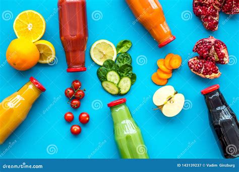Vegetable and Fruit Juice in Bottles for Diet Drink on Blue Background Top View Mock Up Stock ...