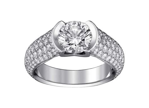 C de Cartier solitaire diamond engagement ring plays with