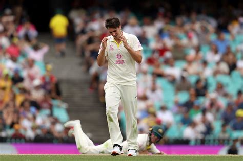 Pat Cummins reacts after a drop off his bowling | ESPNcricinfo.com