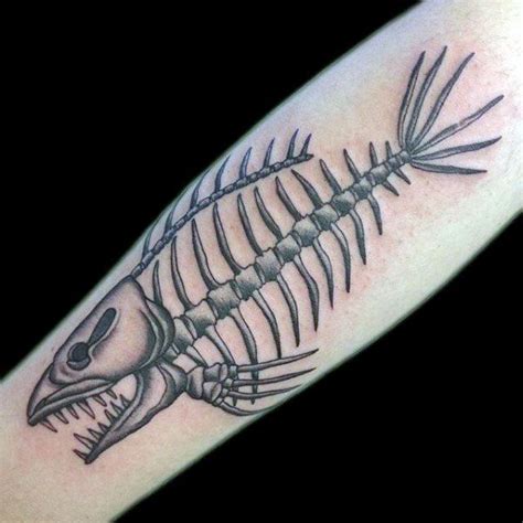 a fish skeleton tattoo on the arm