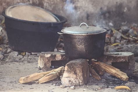 gray, cooking pot, black, basin, pots, fire, smoke, firewood, rocks, outdoor | Pxfuel