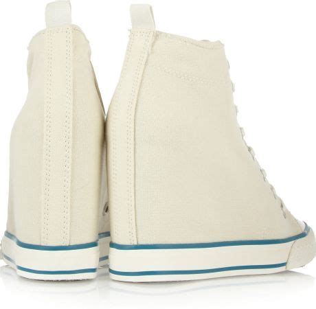 Dkny Grommet Canvas Wedge Sneakers in Beige (Cream) | Lyst