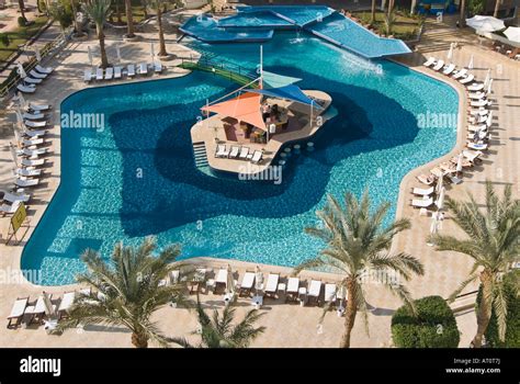 Horizontal aerial view of a hotel swimming pool with a swim up bar Stock Photo: 16164821 - Alamy