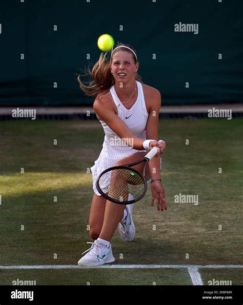 Hannah Klugman in action in the Girls singles on day seven of the 2023 Wimbledon Championships ...