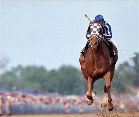 Triple Crown winner Secretariat winning the 1973 Kentucky Derby. He won ...