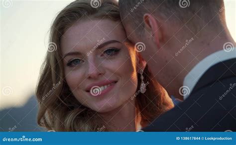 Bride and Groom Walking on Mountain at Sunset Stock Footage - Video of posing, groom: 138617844