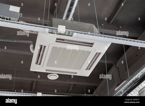 Ceiling mounted cassette type air conditioner Stock Photo - Alamy