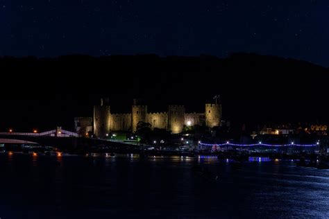 Conwy castle at night Photograph by Steev Stamford