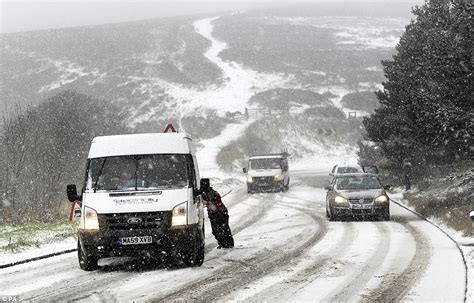 UK weather leaves roads closed after snow blankets the country ...