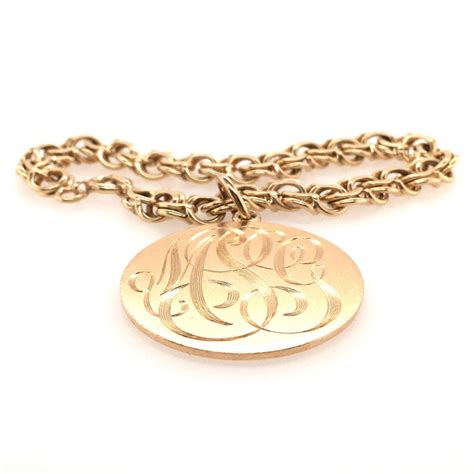 Gold Charm Bracelet at 1stDibs