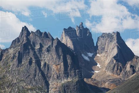 Rugged mountain peaks; Yukon, Canada - Stock Photo - Dissolve