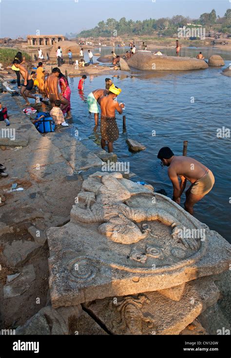 People bathing in the Tungabhadra river. Hampi. Karnataka. India Stock ...