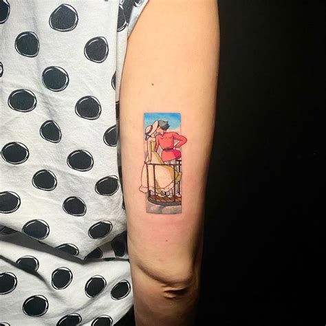 Howl's Moving Castle tattoo located on the tricep.