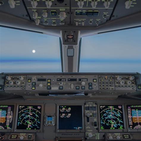 Boeing 777 cockpit. As we are cruising through the night the moon is guiding us the way ...