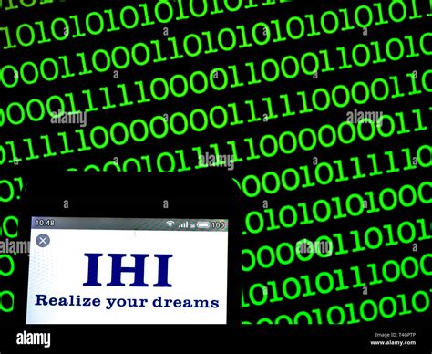 In this photo illustration a IHI Corporation logo seen displayed on a ...