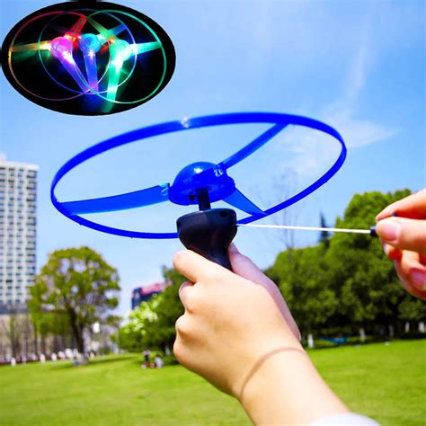 Funny Colorful Pull String UFO LED Light Up Flying Saucer Disc Kids Pull String UFO LED Light Up ...