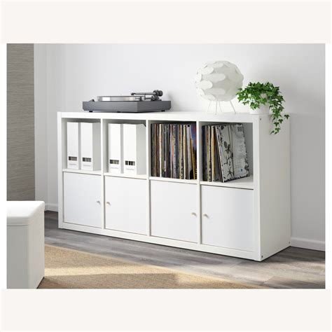 IKEA White Shelving Unit W/ 4 Storage Boxes - AptDeco