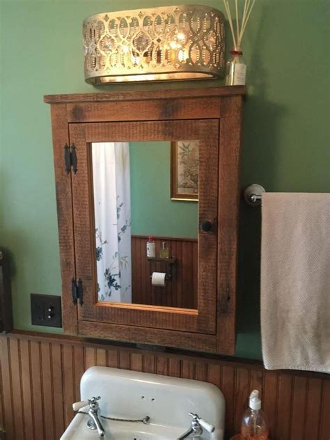 barn Medicine cabinet with mirror made from 1892 barn wood #homeProjects | Rustic medicine ...