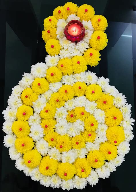 Beautiful yellow and white flowers design using thermocol balls for Diwali festival. | Flower ...