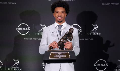 The Heisman Trophy winner won’t play in ReliaQuest Bowl vs Wisconsin